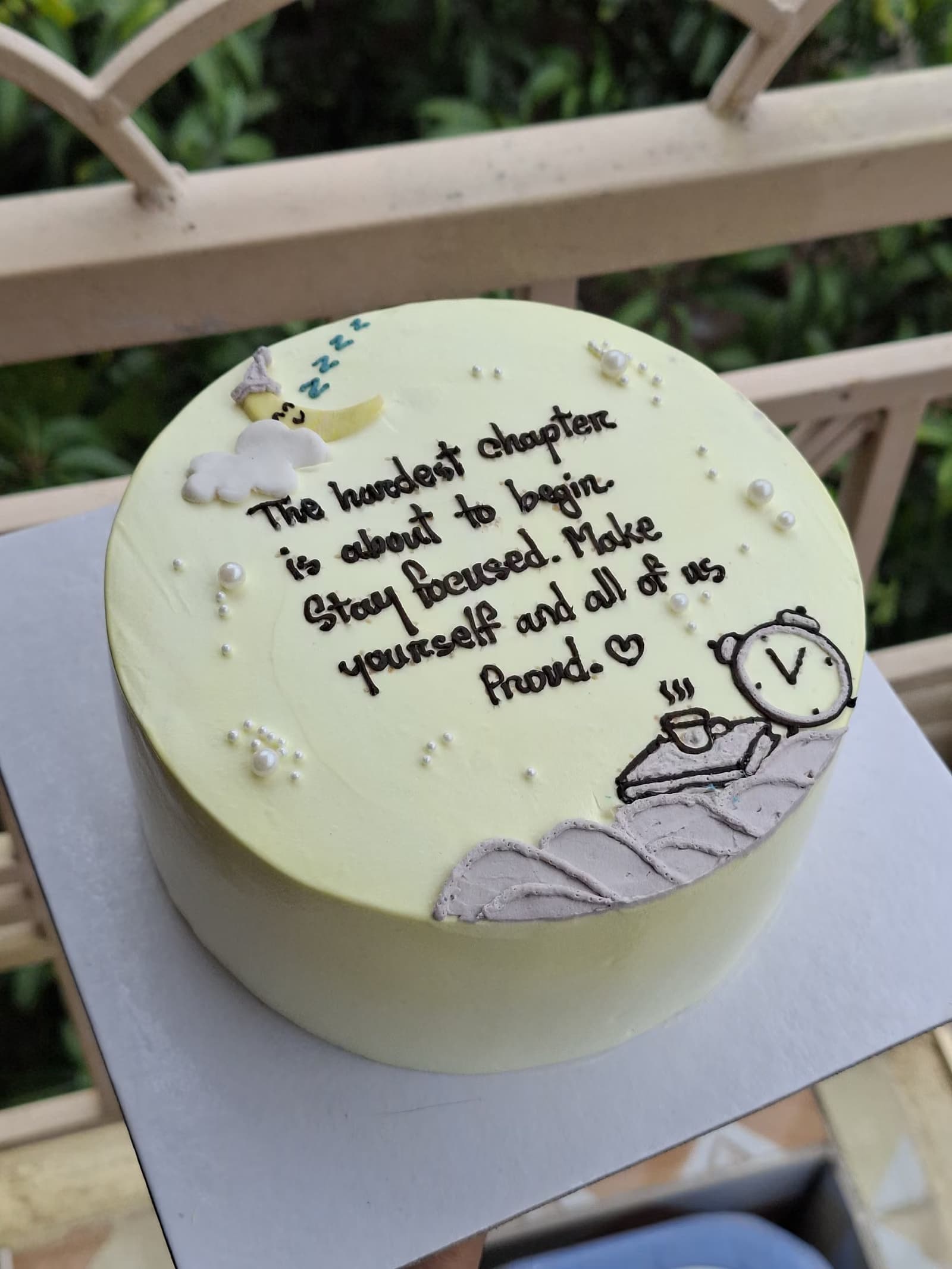 Sage green cake with a handwritten quote