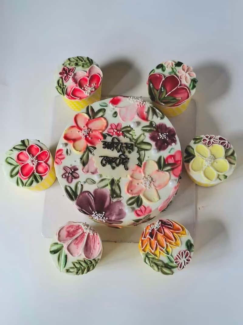 Hand-piped floral cupcakes