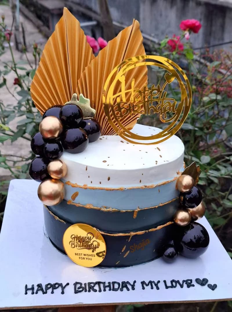 Navy and gold birthday cake