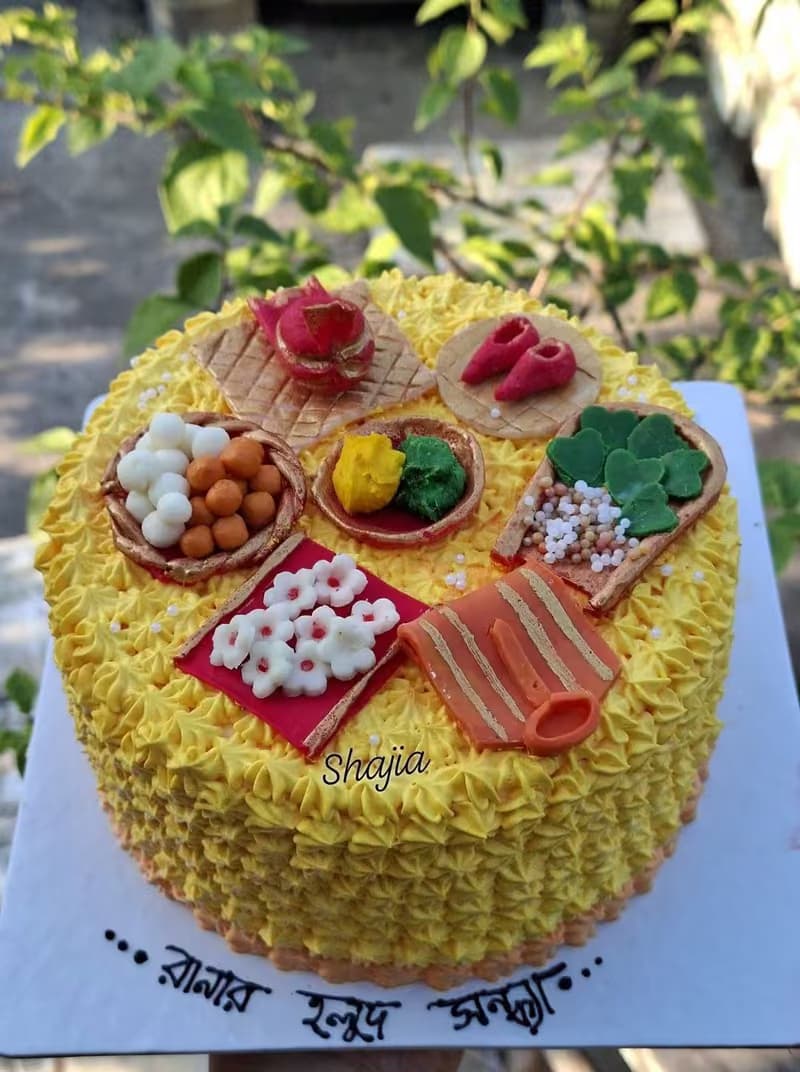 Pitha and sweets themed cake