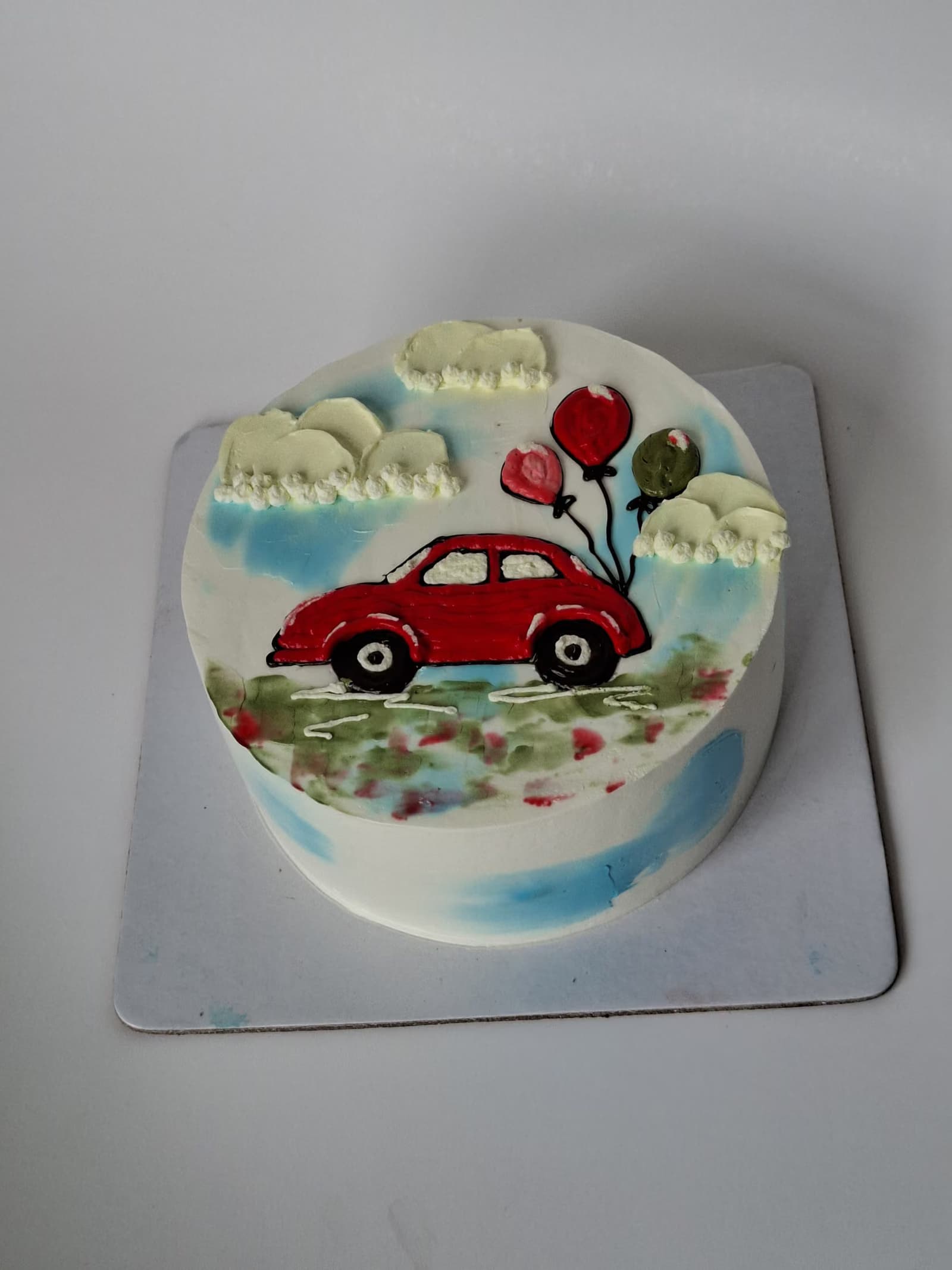 Hand-painted red car cake
