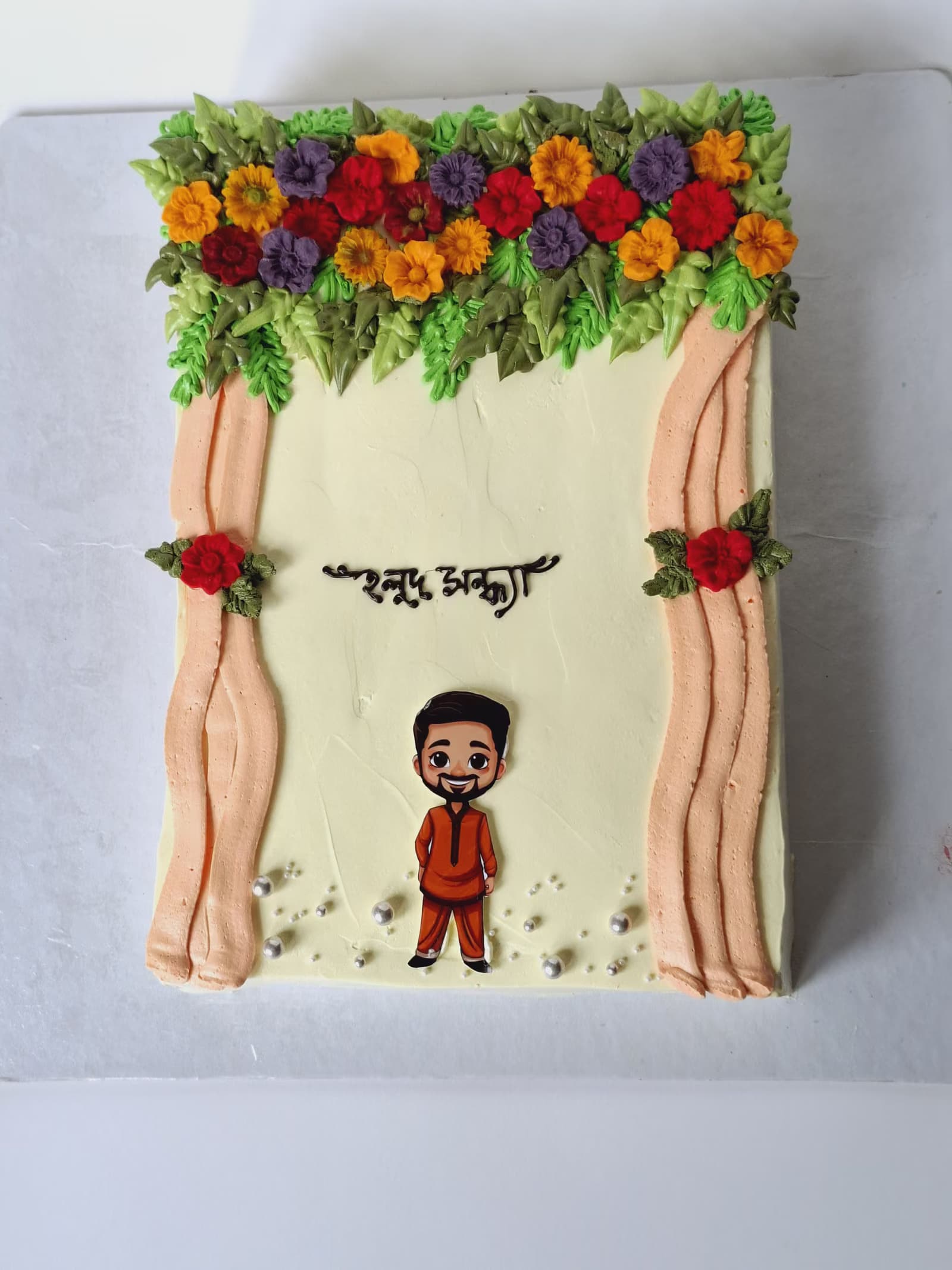Curtain and flower cake with a hand-modelled figure