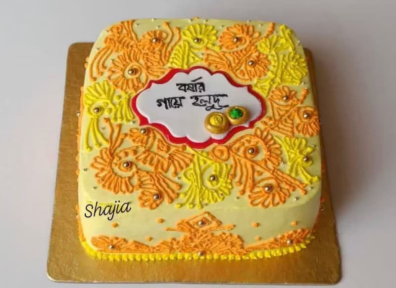 Bengali calligraphy cake in marigold