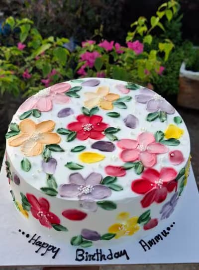 Piped flower birthday cake
