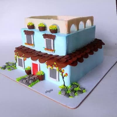 Sculpted two-storey house cake
