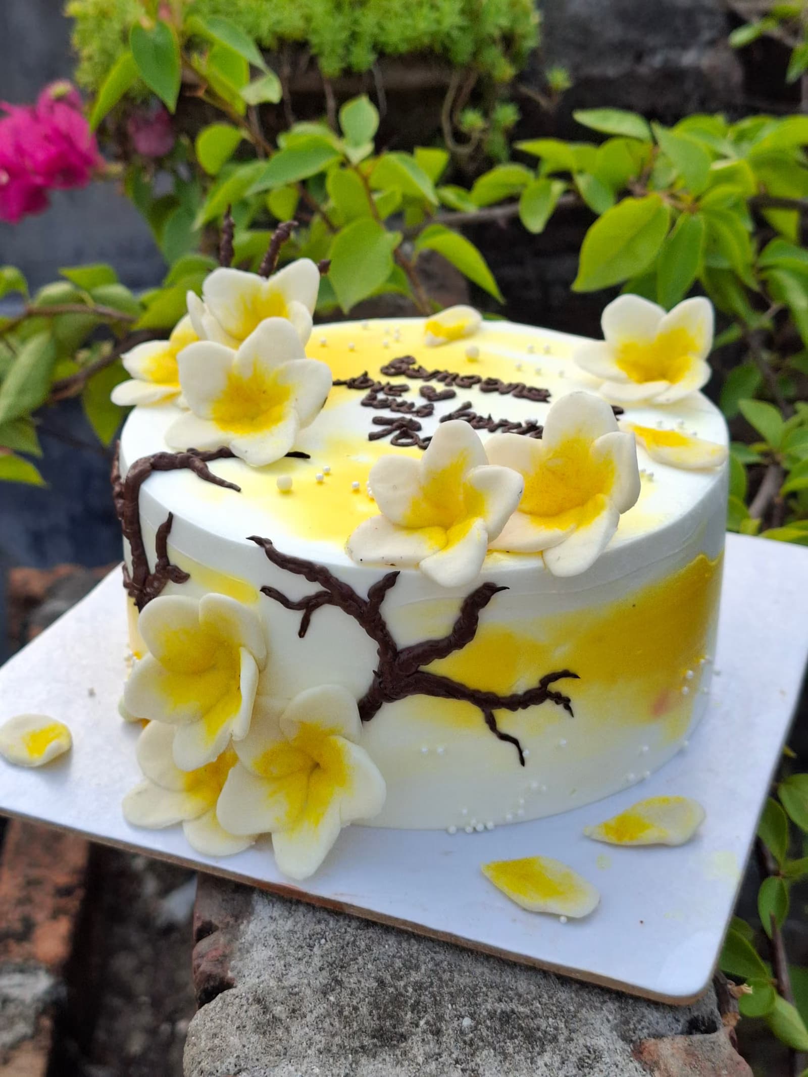 Frangipani and painted branch cake