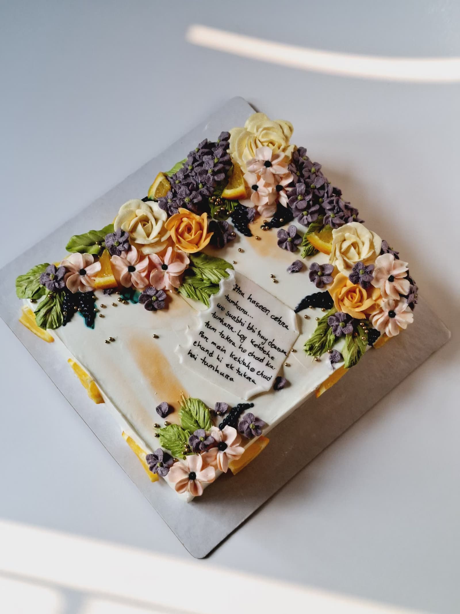 Rose and handwritten-letter cake
